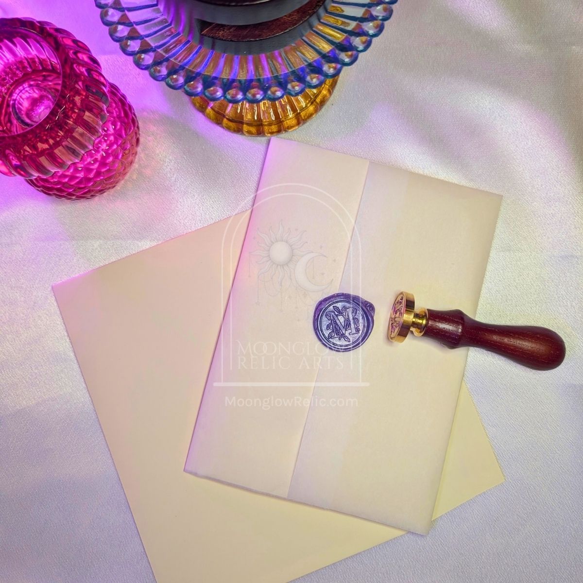 Moonglow Relic folded charm card sealed with wax